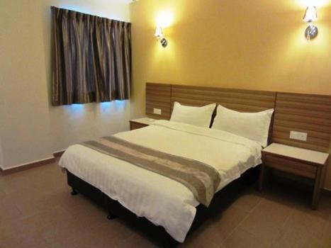 Grand Court Hotel Телук-Інтан Номер фото